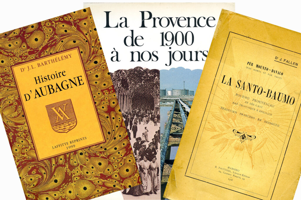 Trois ouvrages de la bibliothèque. De gauche à droite : Histoire d'Aubagne du docteur Jean-Louis Barthélemy, La Provence de 1900 à nos jours et La Santo-Baumo du Docteur Joseph Fallen. - Agrandir l'image, fenêtre modale